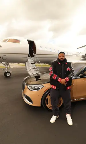 DJ Khaled wearing Louis Vuitton bag