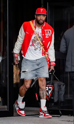 PJ Tucker’s Outfit in Louis Vuitton Jacket, Jordan Sneakers & Philadelphia Phillies Cap (2024)