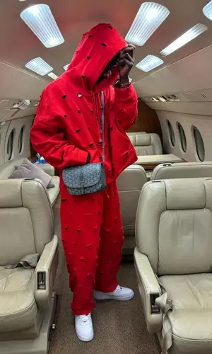 Eduardo Camavinga’s Outfit in Jacquemus Hoodie, Goyard Bag & Nike (2024)