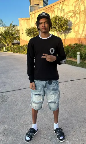 Nemzzz wearing Chrome Hearts t-shirt