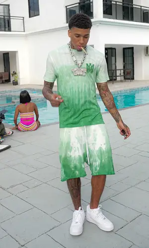 NLE Choppa wearing Amiri shorts