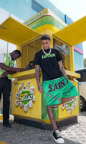 NLE Choppa wearing Saint Michael shorts