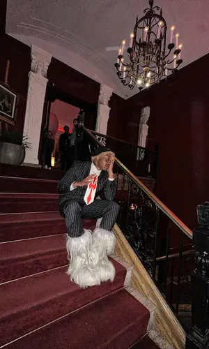Lil Tracy’s Outfit in Rick Owens Boots, Arc'teryx Hat & Moncler (2024)