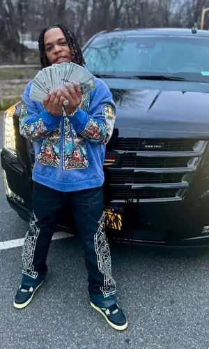 Don Q’s Outfit in Who Decides War Hoodie, Jordan Sneakers & Union Los Angeles (2024)