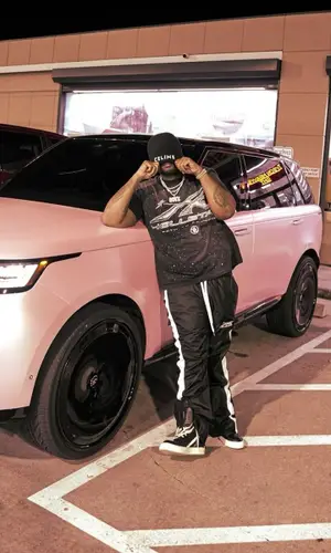 Peezy wearing Hellstar pants