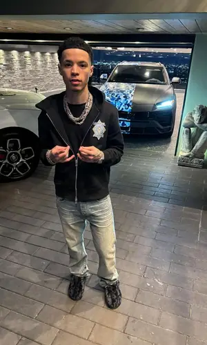 Lil Mosey’s Outfit in Amiri Hoodie & Dior Sandals (2024)