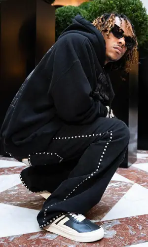 Rich The Kid wearing Lanvin pants