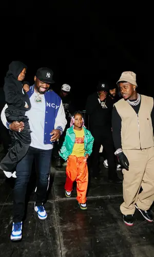 DaBaby wearing Prada glov
