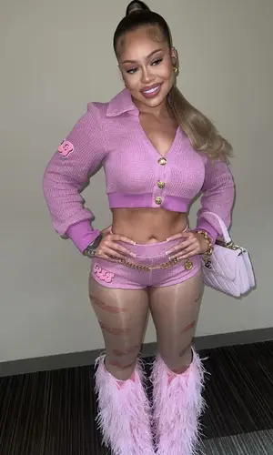 Latto wearing Giuseppe Zanotti boots