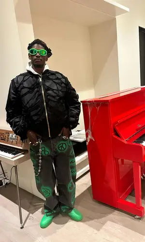 ASAP Nast wearing Bottega Veneta eyewear