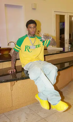 NLE Choppa wearing Rhude t-shirt