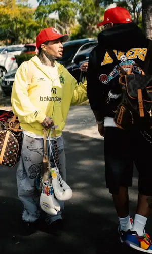 Gervonta Davis’ Outfit in Balenciaga Hoodie, Chanel Bag & New Era Cap (2024)