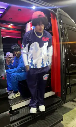 King Cid wearing SoleBoy top
