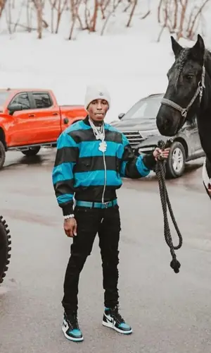NBA YoungBoy wearing Moncler hat