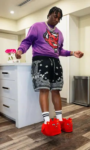 Fredo Bang’s Outfit in Amiri Shorts & Ripndip Sandals (2024)