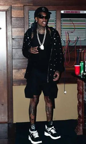 Wiz Khalifa wearing Converse sneakers