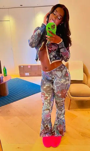 Flo Milli wearing Jean Paul Gaultier top