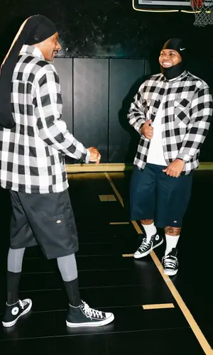 Snoop Dogg wearing FashionNova shirt