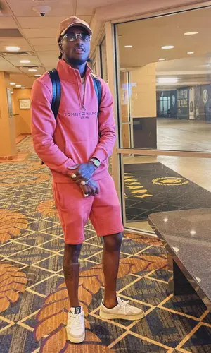 DC YoungFly wearing Louis Vuitton cap