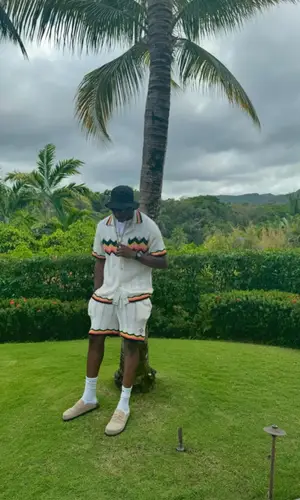 Rob49’s Outfit in Casablanca Shirt, Nike Socks & Versace Sandals (2024)