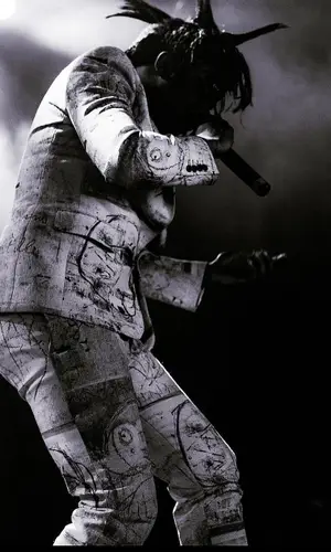 Lil Tracy’s Outfit in Alexander McQueen Jacket, Rick Owens Boots & Moncler (2024)