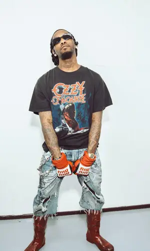 Offset wearing Miu Miu glov