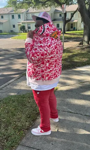 Rod Wave’s Outfit in Bape Hoodie, Nike Sneakers & Chrome Hearts Cap (2024)