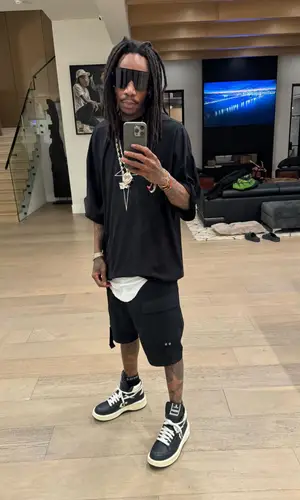 Wiz Khalifa wearing Converse sneakers