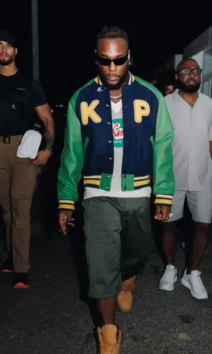 Burna Boy wearing Kenzo jacket
