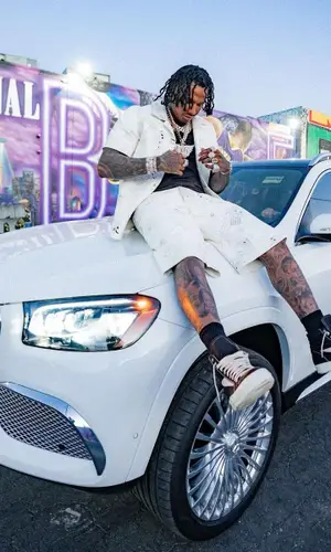 Moneybagg Yo wearing Cout De La Liberte shorts