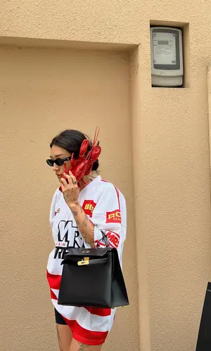 Peggy Gou wearing Hermes bag