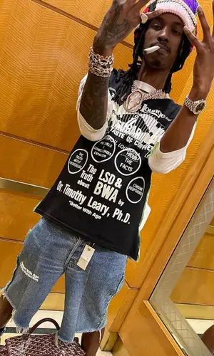 Baby Smoove’s Outfit in Better With Age Shorts, Balenciaga Sneakers & Goyard Backpack (2024)