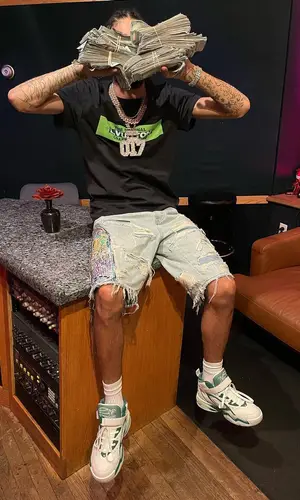 OT7 Quanny wearing Louis Vuitton sneakers