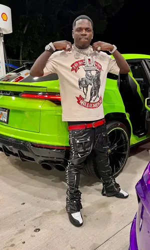 Big Boogie’s Outfit in Millii Merch T-Shirt, Guapi Pants & Jordan Sneakers (2024)
