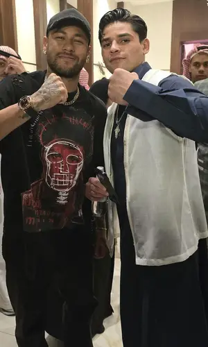 Neymar’s Outfit in Dust Of Gods T-Shirt, Louis Vuitton Sneakers & Balenciaga Cap (2024)