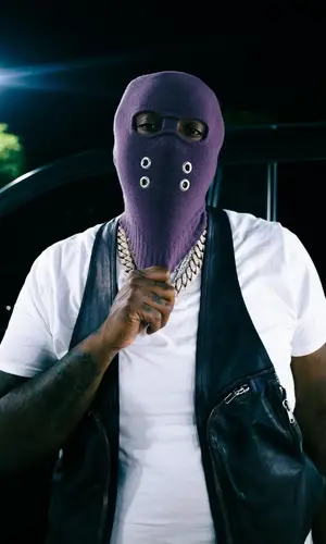 Peezy wearing Rick Owens hat
