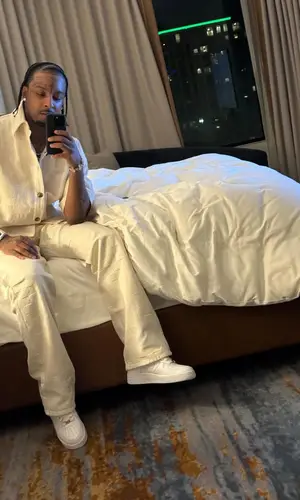 21 Savage wearing Louis Vuitton pants