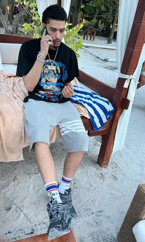 Jay Critch’s Outfit in Thom Browne Shorts, Balenciaga Sneakers & Saint Michael Socks (2024)