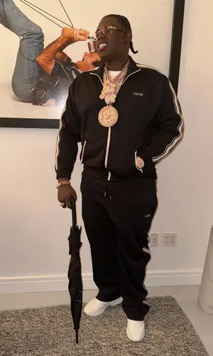 Sheff G wearing Celine sneakers