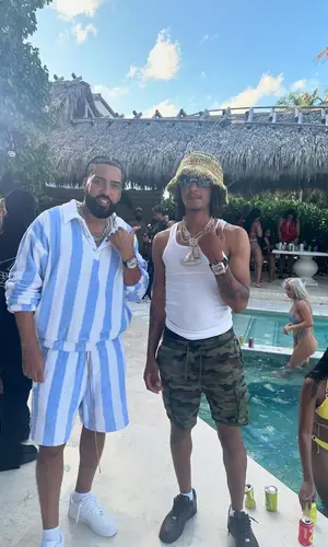 French Montana’s Outfit in Rhude Sweatshirt & Nike Sneakers (2024)
