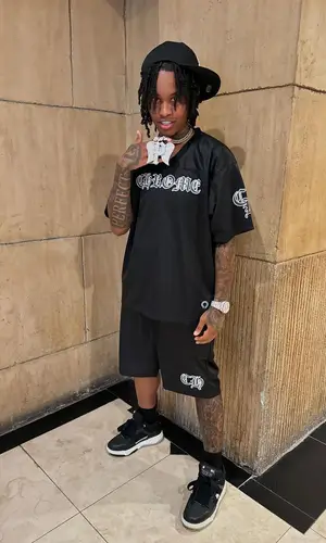 Lil Perfect’s Outfit in Chrome Hearts Jersey, Amiri Sneakers & New Era Cap (2024)
