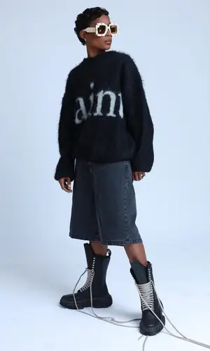 DeJ Loaf wearing Rick Owens boots
