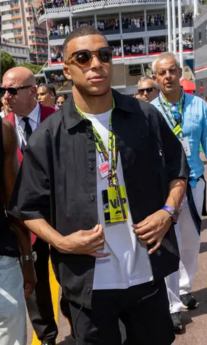 Kylian Mbappe wearing Nike shirt