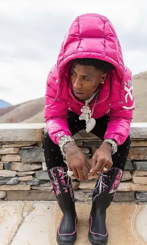 NBA YoungBoy wearing Muck Boots boots