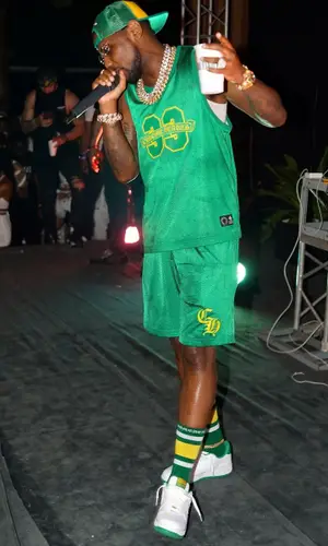 Fabolous wearing Chrome Hearts cap