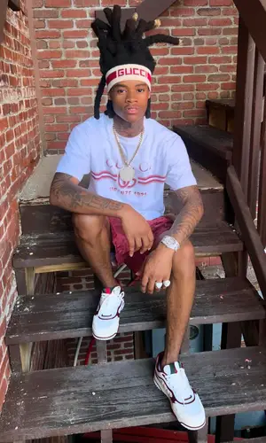 Kuttem Reese wearing Gucci hat