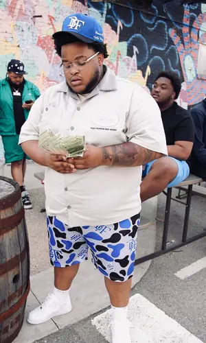 1Up Tee wearing Supreme sock