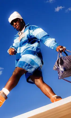 2Rare’s Outfit in Louis Vuitton Shirt, Timberland Boots & Goyard Bag (2024)