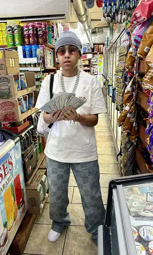 Stunna Gambino’s Outfit in Nike Sneakers & Louis Vuitton Hat (2024)