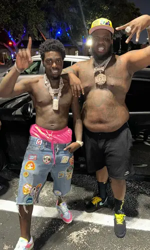 Maxo Kream’s Outfit in Balenciaga Shorts, Nike Sneakers & Chrome Hearts Socks (2024)